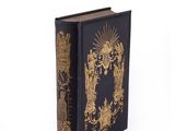 a black book with a gold design on it
