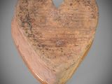 wooden heart shaped box on grey background with copy space for text