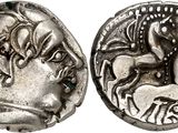 une pièce d'argent sur laquelle figure l'effigie d'un cheval et de son cavalier