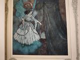 a picture of a picture of a woman in a dress