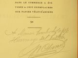 an old book with a handwritten title on the front of it