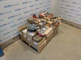 a pile of boxes of assorted items on a pallet