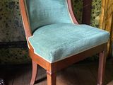 a chair that is sitting on a wooden floor