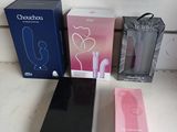 three boxes and one box of earphones on a table