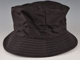 the hat is black and has a small patch on the side