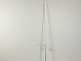 a black and white photo of a fishing rod on a stand
