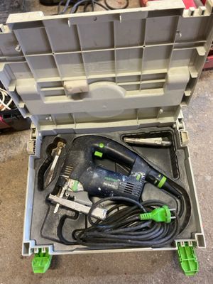 a tool box with tools in it sitting on the floor