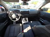 the interior of a car with a steering wheel and a dash board
