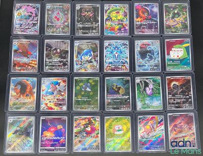 many different types of pokemon cards in this picture
