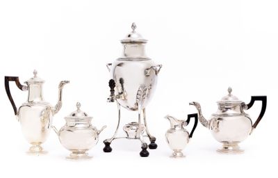 an image of a group of silver plated tea and coffee pots