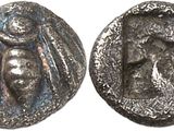 une pièce d'argent représentant une femme