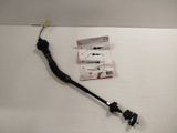 a cable that is attached to a white wall