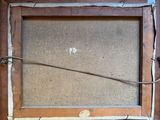 an old picture of a wooden frame with a rope hanging from it ' s side
