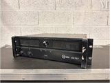 an image of a black amplifier sitting on top of a table