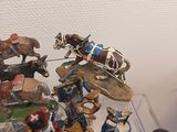 many figurines that are sitting on a table