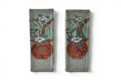 pair of asian style vases with flowers and birds on them