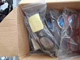 many pairs of glasses in a box on the table