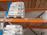 many rolls of toilet paper on the shelves in the warehouse
