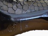 a close up of a shoe with a snake skin pattern on it