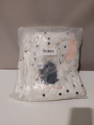 a plastic bag with a stuffed animal inside of it
