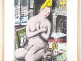 framed print of a nude woman sitting on a rug in a living room