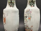 two vases that have been decorated with animals on them