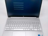 a laptop with a blue screen sitting on a table