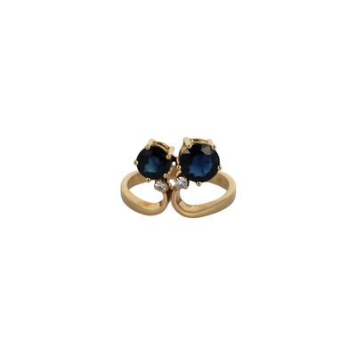 an image of a pair of blue sapphire and diamond rings