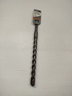 a small metal tool that is laying on a table