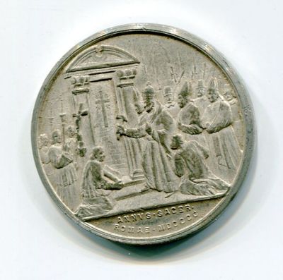 une pièce de monnaie en argent portant l'image d'un homme et d'une femme