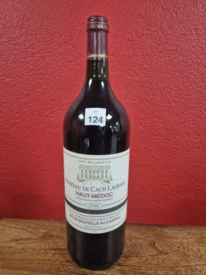 a bottle of wine that is sitting on a table