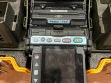 a tablet computer sitting on top of a tool case