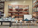 a large room with a lot of shelves and a lot of tools