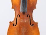 an old violin on a white background