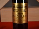 a bottle of wine that is sitting on a table