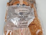 a stuffed animal in a plastic bag on a hanger