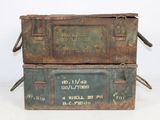 two old metal boxes stacked on top of each other