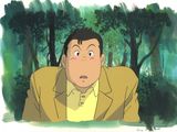 an image of a man in a yellow jacket looking at something