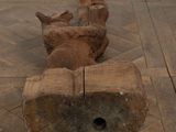 a piece of wood on the floor with a hole in it