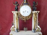 a clock that is sitting on top of a table
