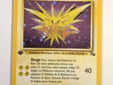 a close up of a pokemon card on a table
