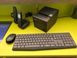 a desktop computer and a keyboard on a desk