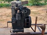 an old machine that is sitting on the ground