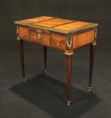 an image of a small table with a drawer on it