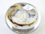 a glass object that has a label on it