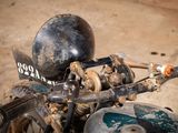 a close up of a motorcycle with a helmet on it ' s head