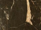 black and white marble with gold veining in a bathroom