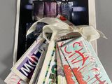 a picture of a book with a bunch of perfumes on it