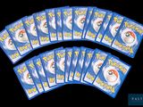 a lot of pokemon cards on a black background