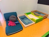 two beds that are next to each other on the floor